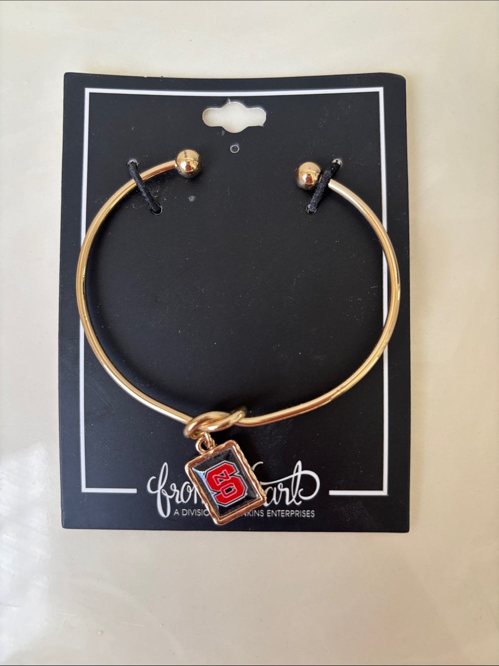 Gold Tone Hoop Bangle Bracelet with Red NC State Charm